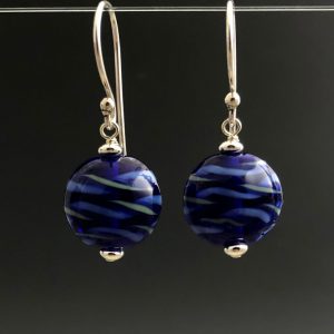 Becky Congdon "Blue Moon Lentil Earrings" handmade flameworked lentil-shaped glass beads with sterling silver beads and ear wires $38./pair Inquire on availability