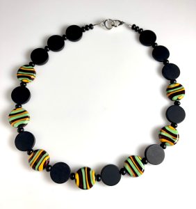 Becky Congdon "Catherine's Paradise Necklace" handmade flameworked glass tab disk beads, onyx gemstone beads, sterling silver clasp 20" length $210.