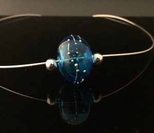 Becky Congdon "Constellation Omega Necklace - Aqua" handmade flameworked hollow bead, applied silver wire, sterling silver chain and findings 18" length $95. SOLD